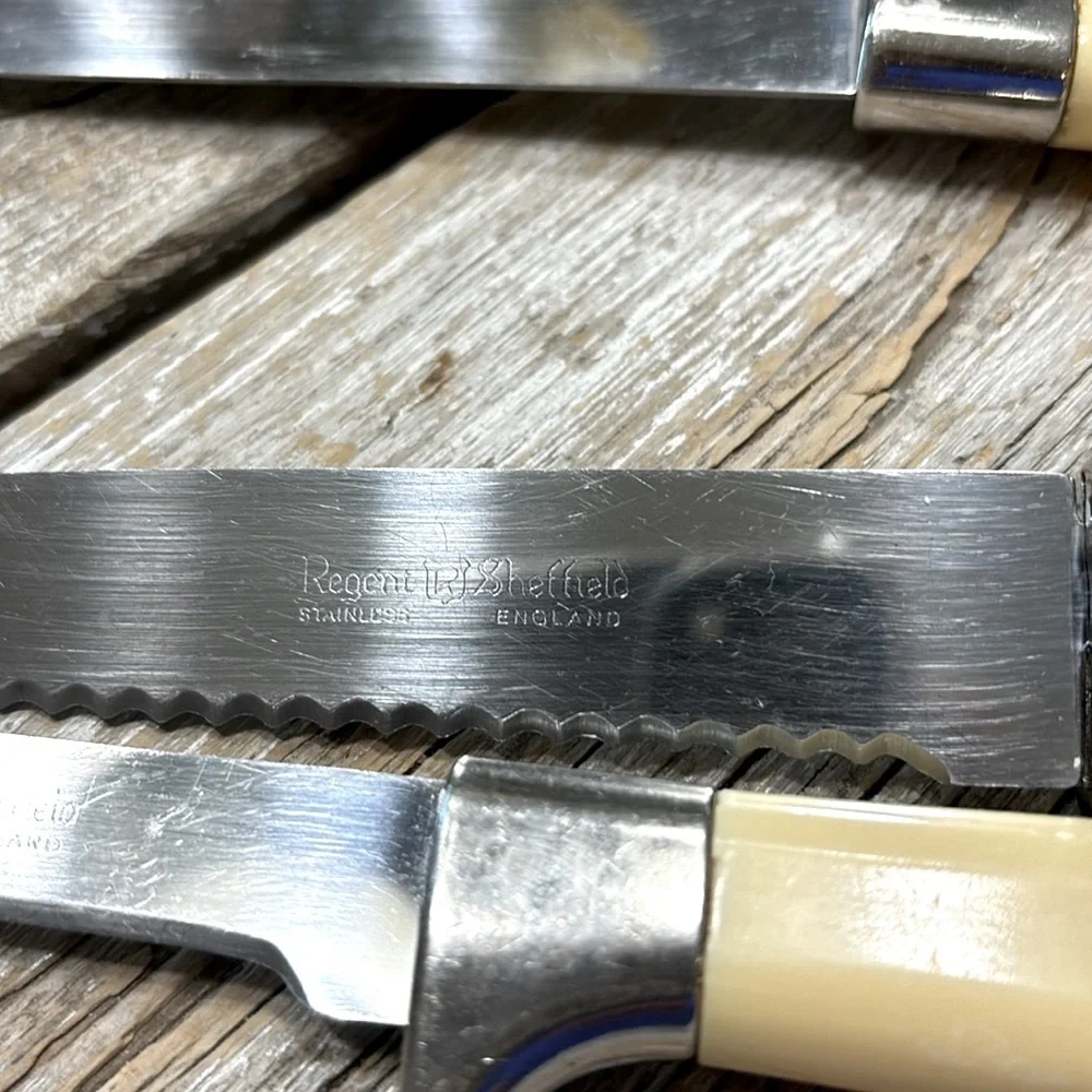 8 Vintage Regent Sheffield Knives. Marked England Stainless Steel MCM